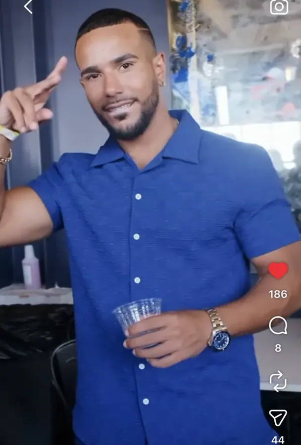 Guest in a blue polo shirt inside the venue